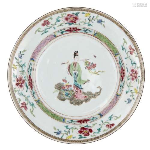 A Chinese porcelain famille rose dish, Yongzheng period, painted to the central reserve with Ma