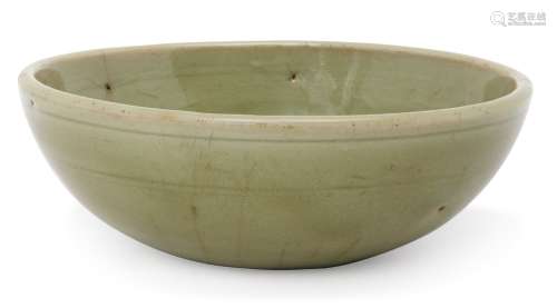 A Chinese Longquan celadon bowl, Ming dynasty, with steep sides and raised central reserve to
