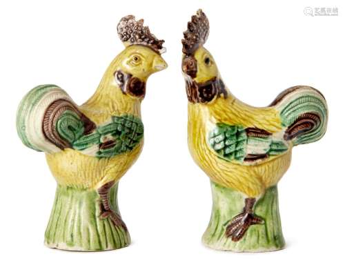 A pair of Chinese sancai biscuit porcelain chickens, mid-19th century, 11.5cm highOne has two