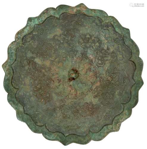 A Chinese bronze shaped mirror, Northern Song dynasty, the central knob within flowerhead field,