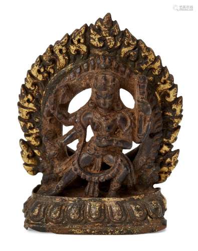 A South East Asian wood and gilt metal figure of Chenrezig, 17th/18th century, the carved wood deity