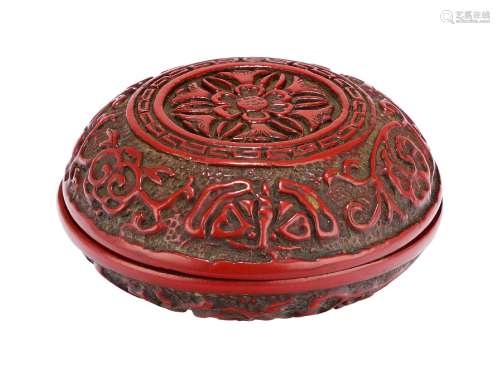 A Chinese cinnabar lacquer circular seal paste box and cover, late Qing dynasty, carved to the