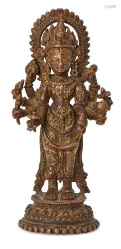 A South East Asian copper alloy figure of Avalokitesvara, 19th century, standing, with eight arms