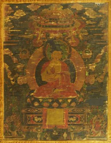 A Tibetan Thangka depicting Shakyamuni Buddha, 18th century, distemper on cloth, with two
