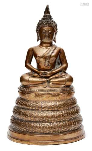A South East Asian copper alloy figure of Buddha Muchalinda, 18th/19th century, seated in dhyanasana
