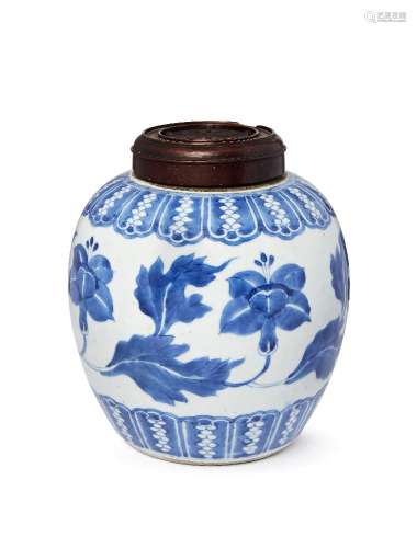 A Chinese porcelain jar, 18th century, painted in underglaze blue to the body with a continuous