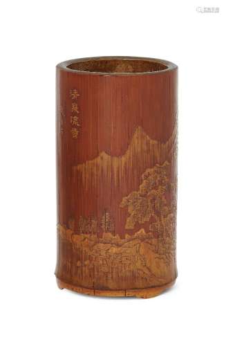 A Chinese liu qing bamboo brush pot, 18th century, finely carved with a scholar crossing a bridge in