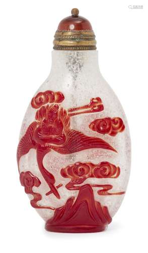 A Chinese cameo glass snuff bottle, 19th century, carved in red over clear glass with two figures