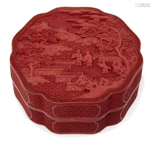 A large Chinese cinnabar lacquer lobed box, 18th century, finely carved to the cover with an