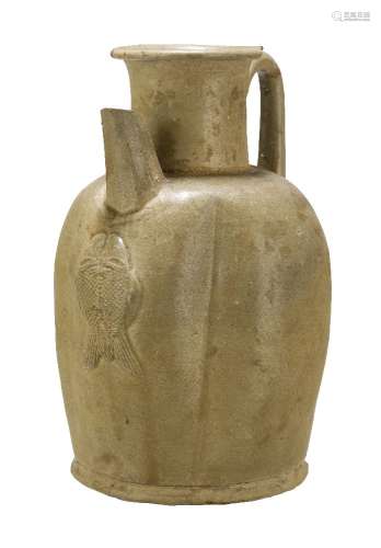 A Chinese Changsha ewer, Tang dynasty, 9th century, covered in a pale olive green glaze, with
