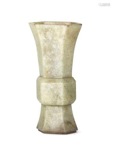 A Chinese celadon jade archaistic gu form vase, 17th century, of compressed hexagonal form, with
