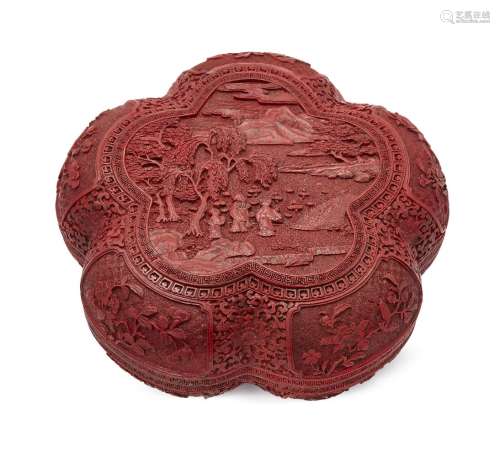 A Chinese cinnabar lacquer pentafoil box and cover, Qianlong period, the central reserve of the