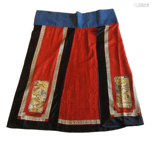 Four Chinese silk skirts, early 20th century, one embroidered with a deer amid floral sprays,