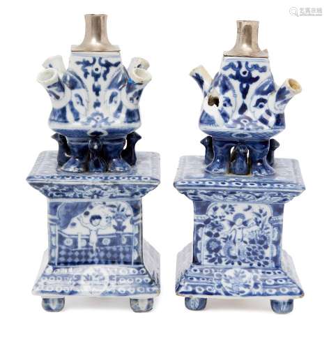 A pair of Chinese porcelain square tulip vases, 18th century, painted in underglaze blue to the main
