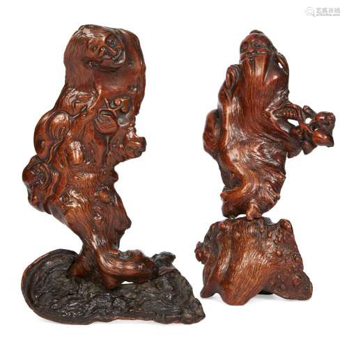 A pair of Chinese bamboo root carvings, late Qing dynasty, depicting Shoulao holding a fruiting
