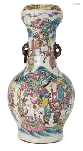 A Chinese porcelain famille rose vase, late 19th century, painted with warriors in a continuous