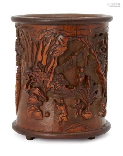 A Chinese carved bamboo brush pot, 20th century, decorated with scholars, attendants, and children