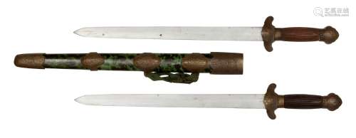 A Chinese double sword (shuang jian), 19th century, with green tortoiseshell and brass mounted