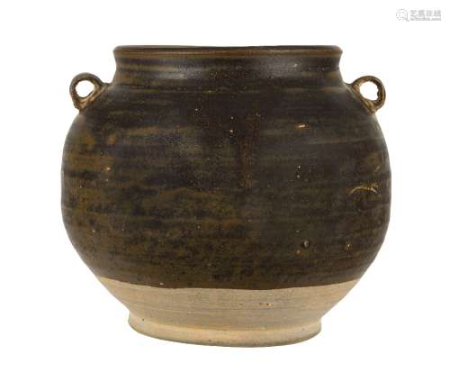 A Chinese grey stoneware jar, Tang dynasty, with wide mouth and two lug handles to shoulders covered