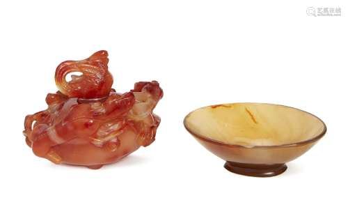 A Chinese carnelian agate water pot and cover, late 19th century, carved with three chi-long
