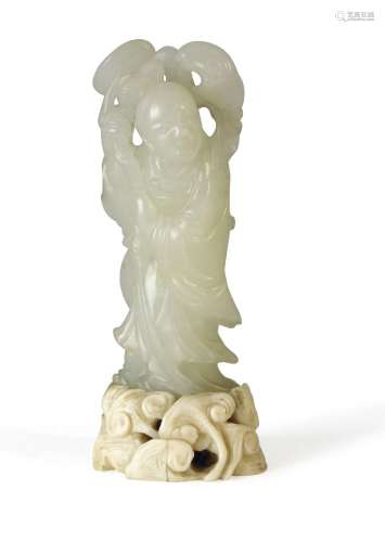A fine white jade carving of a female immortal holding a sprig of lingzhi fungus, 18th century,