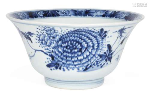 A Chinese porcelain bowl, Kangxi period, painted in underglaze blue to the interior with a floral