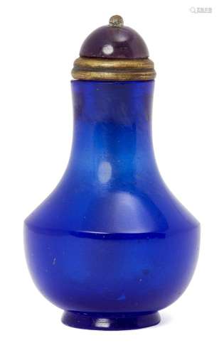 A Chinese Peking glass snuff bottle, 19th century, of midnight blue tone, with slender tapering neck