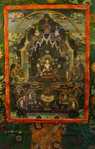 A Tibetan thangka representing Sitatara, 20th century, distermper on cloth, silk mount, 97cm x 61cm,