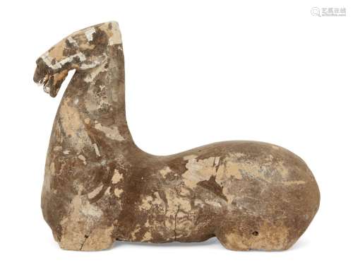A Chinese grey stoneware fragmentary model of a horse, Han dynasty, traces of white painted bridle