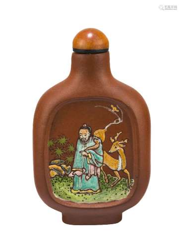 A Chinese Yixing snuff bottle, 19th century, painted in famille rose enamels to one side with