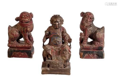 PAIR OF CARVED WOOD AND POLYCHROMZE PAINTED FU LIONS