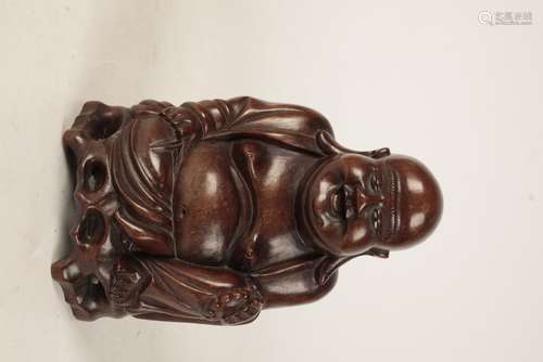 CARVED HARDWOOD FIGURE OF A LAUGHING BUDDHA