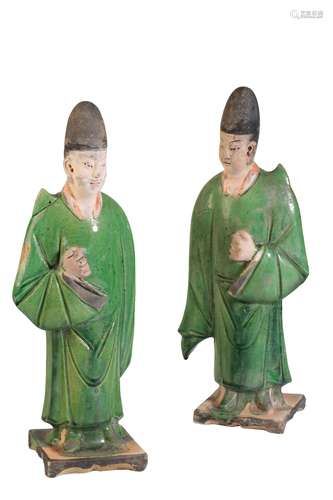 PAIR OF GLAZED POTTERY ATTENDANTS