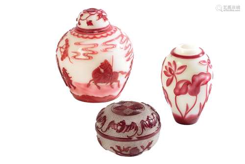 PEKING GLASS RED OVERLAY 'LOTUS' VASE AND COVER