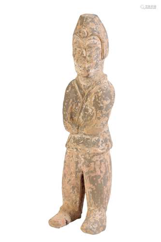 POTTERY FIGURE OF AN ATTENDANT