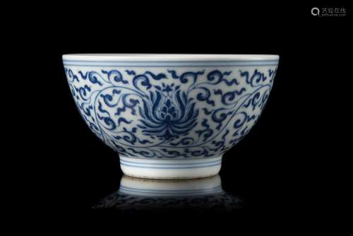 A blue and white bowl decorated with lotus flowers and leaves, with an apocryphal Kangxi