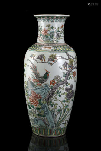 A Famille Verte baluster vase decorated with phaesants amongst flowering branches and pierced