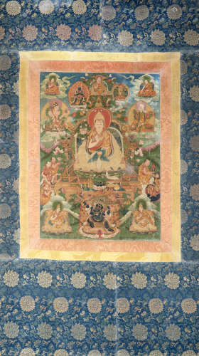 A Thangka depicting Buddhist deities, ink and colours on cloth, framed (slight defects)Tibet, late