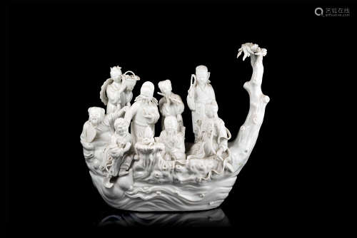 A Blanc-de-Chine porcelain group depicting the Daoist immortals of a raftChina, early 20th century(