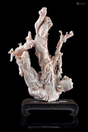 A pale pink coral branch carved with ladies playing musical instruments (slight defects)China, early