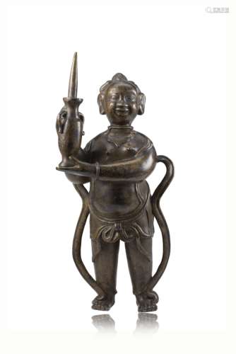 A bronze model of a boy carrying a vaseChina, Ming dynasty (1368-1644), 17th century(h. 27.5 cm.)