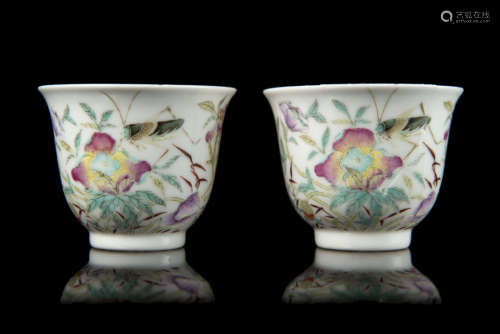 A pair of Famille rose cups decorated with floral motifs, with Guangxu mark and of the