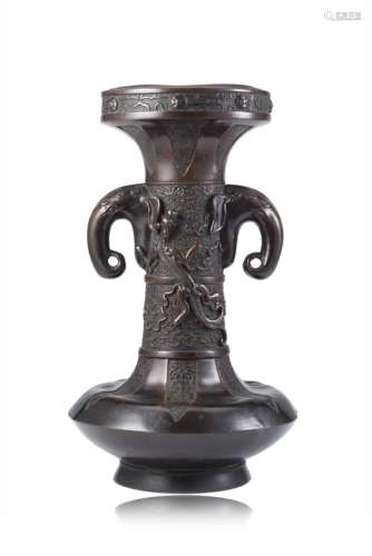 A bronze vase of archaistic form with twin elephant handles and a chilong applied to the neck (