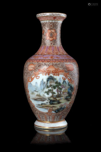 A polychrome enamels and iron-red vase decorated with a landscape scene, with apocryphal Qianlong