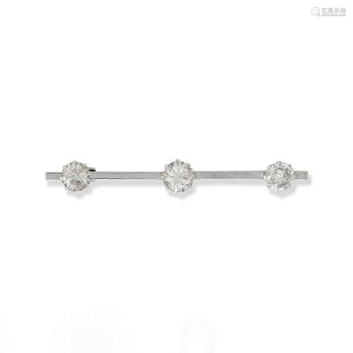 A three-stone diamond bar brooch