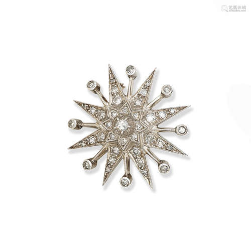 A diamond star brooch