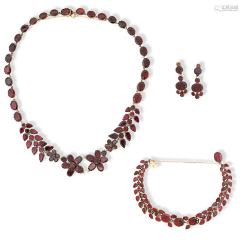 A garnet necklace, bracelet and pair of pendent earrings, 19th century