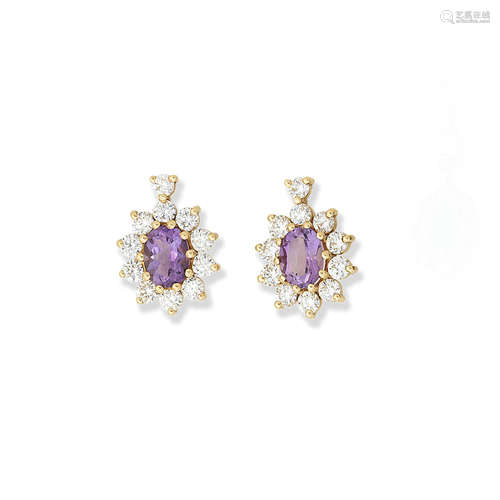 A pair of amethyst and diamond cluster earrings