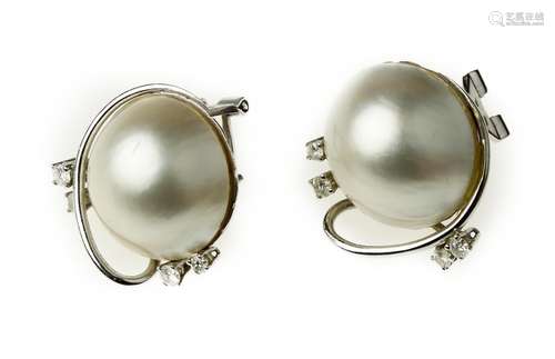 A pair of cultured mabé pearl and diamond earrings