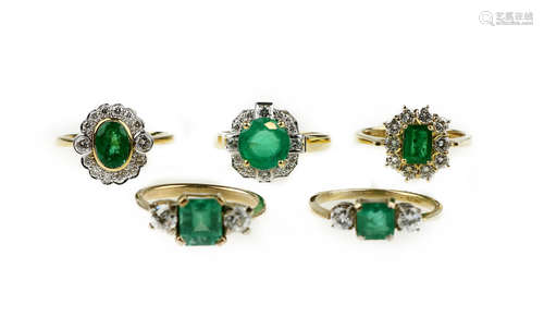 A collection of green gem-set and diamond rings